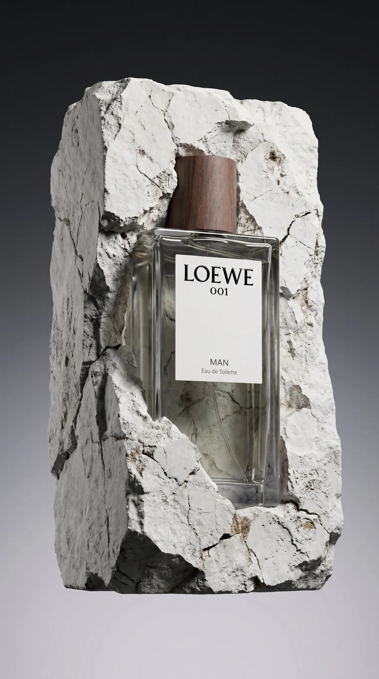 Loewe 001 Man bottle embedded in a block of cracked white stone